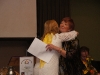 Julie gives Enid a hug